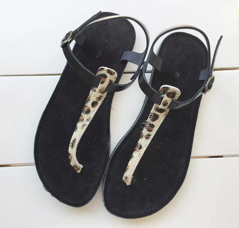 T-strap black leather sandals