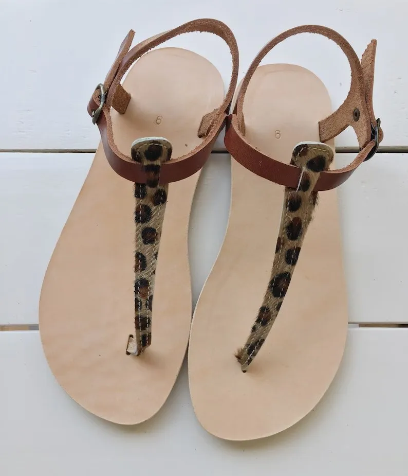 T-strap black leather sandals